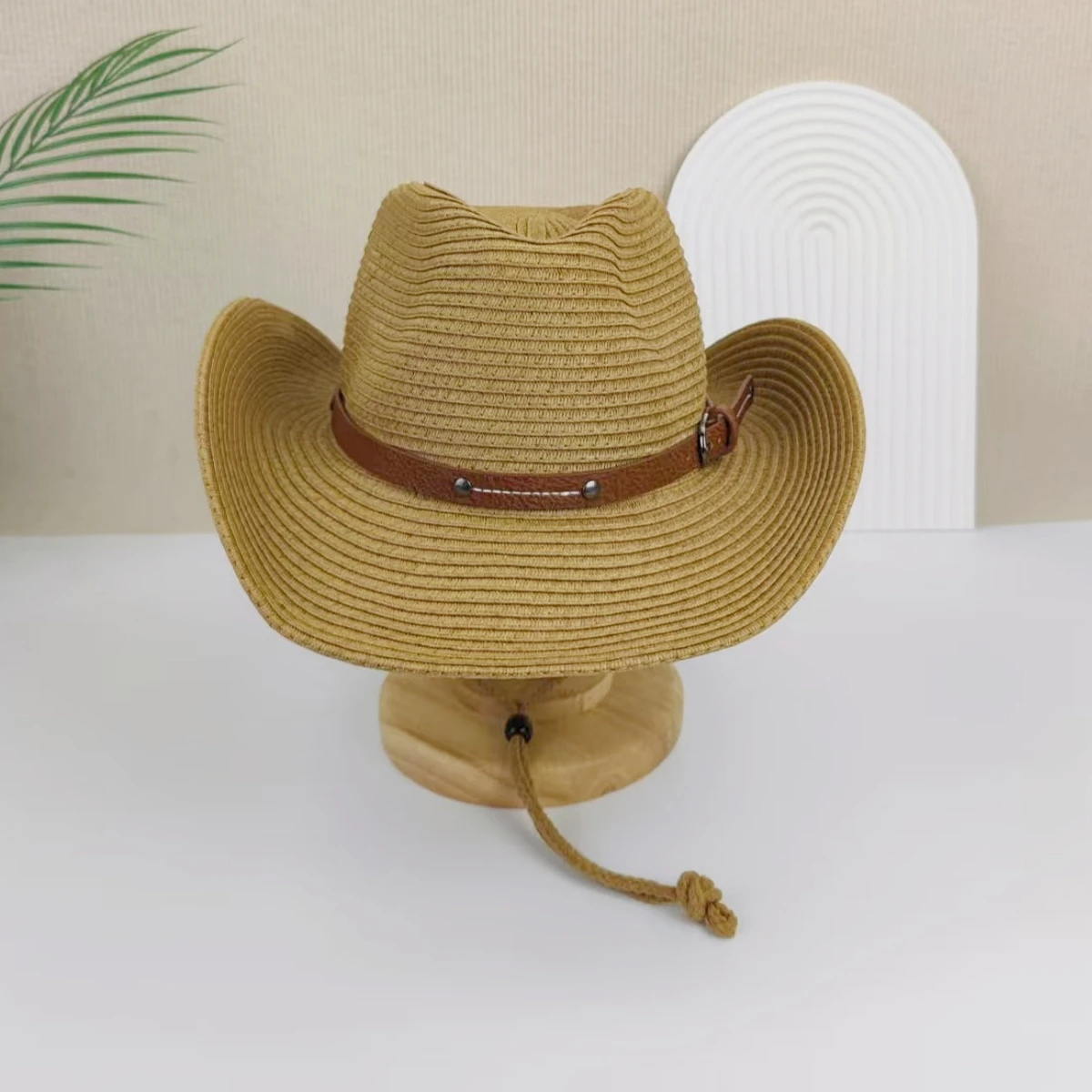 A men\'s and women\'s wide-brimmed western cowboy hat stylish jazz hat, summer beach sun hat carrying a windbreak rope