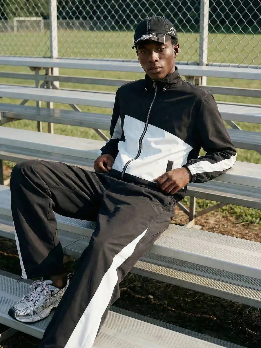 

Black And White Contrast Two Piece Mens Sporty Track Suit Set For Casual Outdoor Wear Jogging And Daily Use
