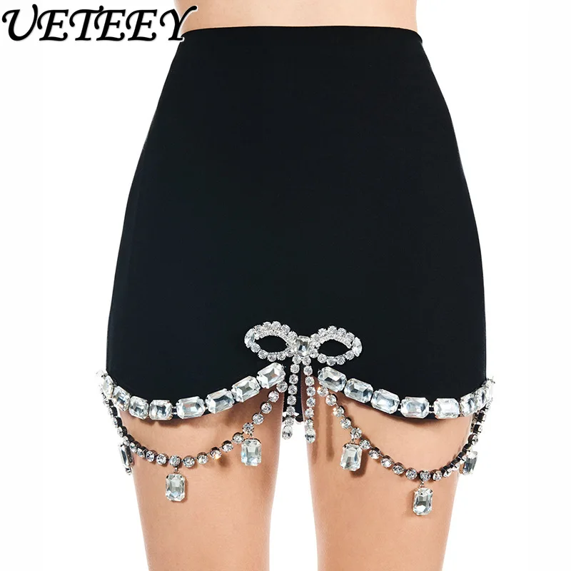

2025 Autumn New Fashion Bead Diamond Bow Design Sense Chain Hem Splicing Mini Skirt Women High Sense Short Black Skirt Street
