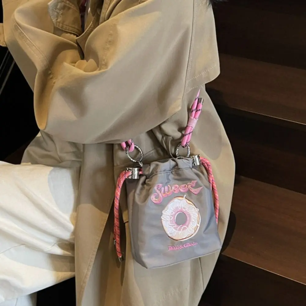 

Sweet Drawstring Bucket Bag Doughnut Pattern Embroidery Design Nylon Crossbody Bag Shoulder Strap Cute Pattern Cute Phone Bag