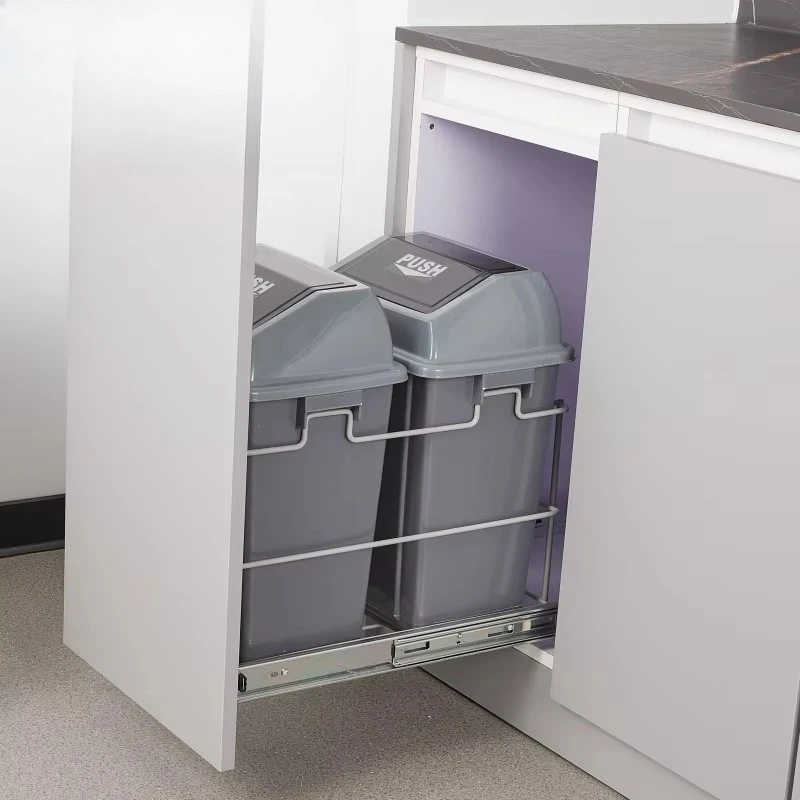 Modern cabinets double pull out trash cans with drawer slides mounted below