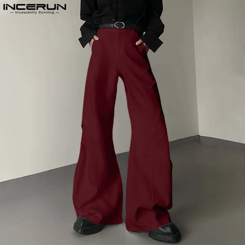 INCERUN Męskie Spodnie Jednolitego Koloru Zapinane na Guziki Joggersy Luźne Casualowe Spodnie z Plisami Męska Moda Streetwearowa Wygodne Spodnie Rozszerzane S-5XL