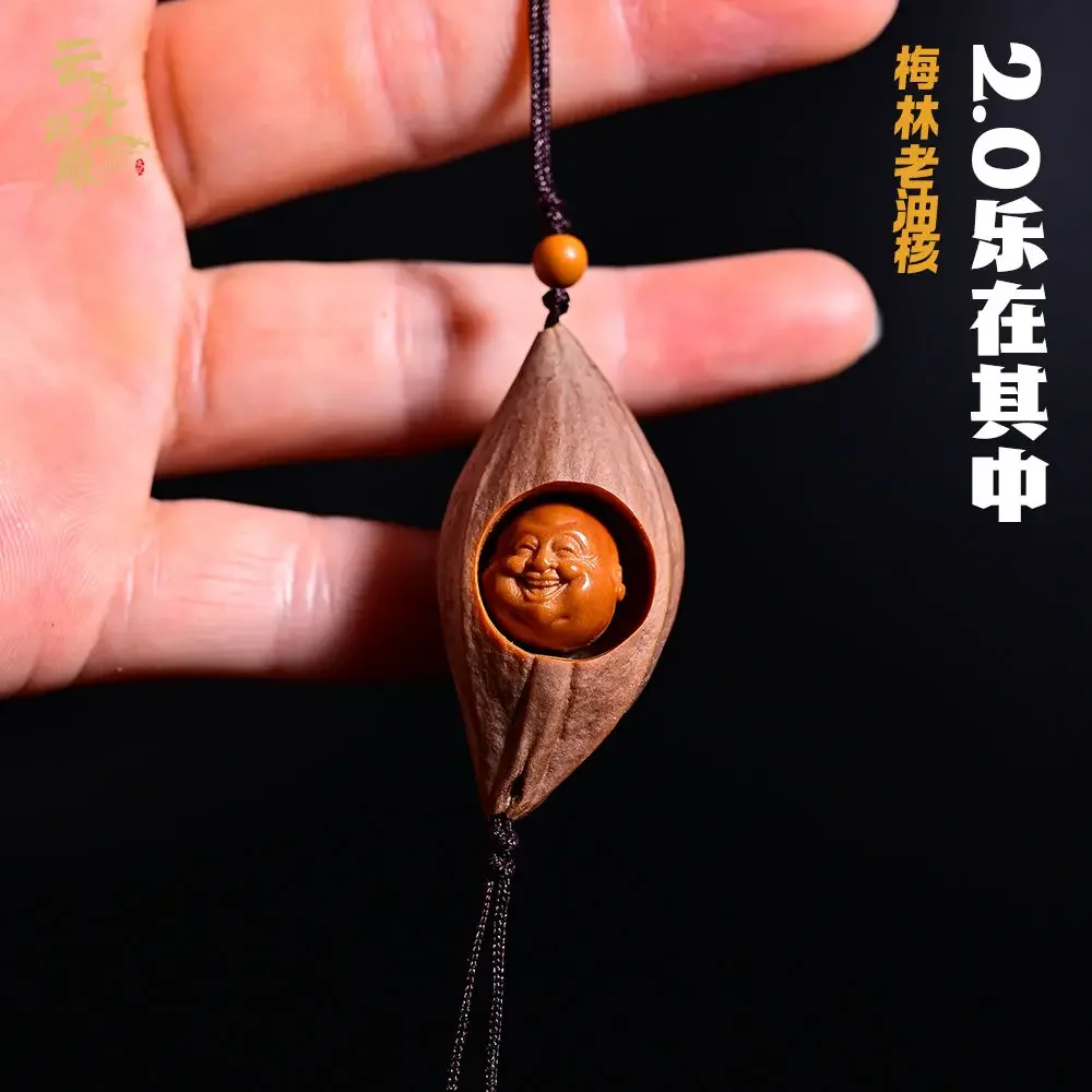 

Su Gong Zhoushan Olive Kernel Pure Hand-carved Enjoying Maitreya Buddha Embedded Single Seed Mobile Phone Pendant Accessories