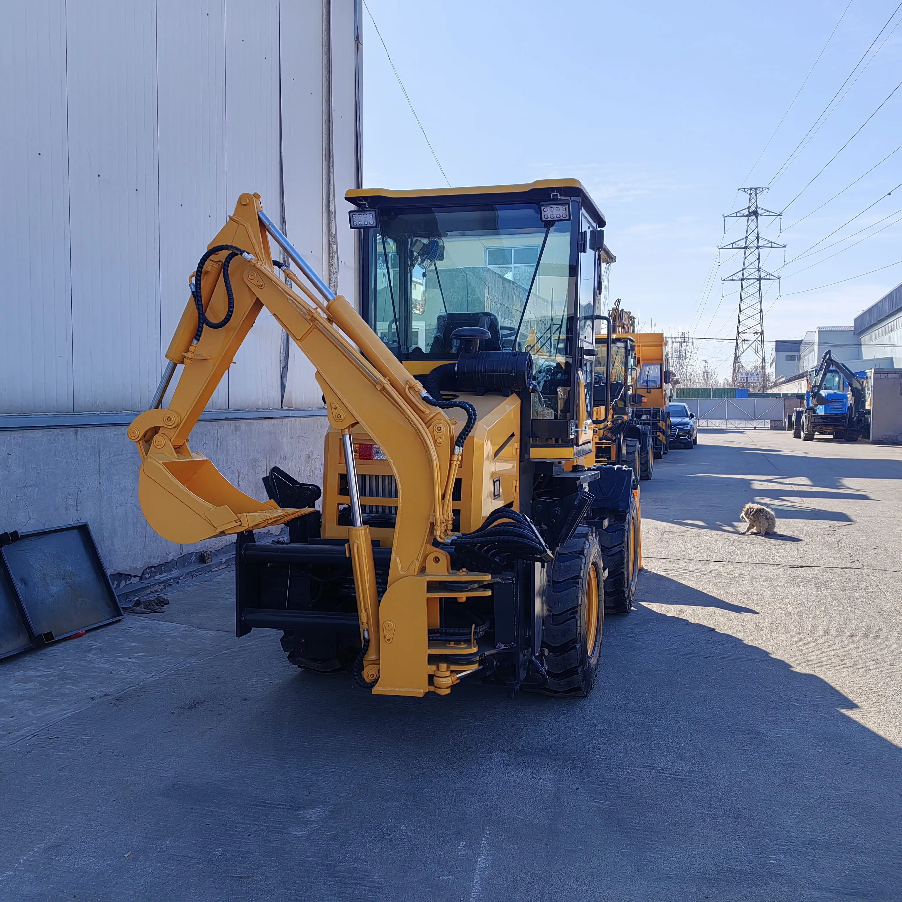 Smooth Lifting and Flexible Steering Practical Four-Wheel Drive Backhoe Loader