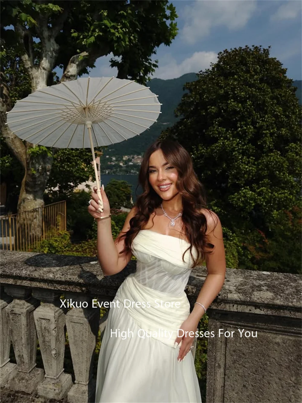 فساتين سهرة طويلة من الشيفون من Xikuo مكشكشة على شكل حرف A أنيقة من فيستدوس دي غالا بدون حمالات مطوي مكشكشة حسب الطلب