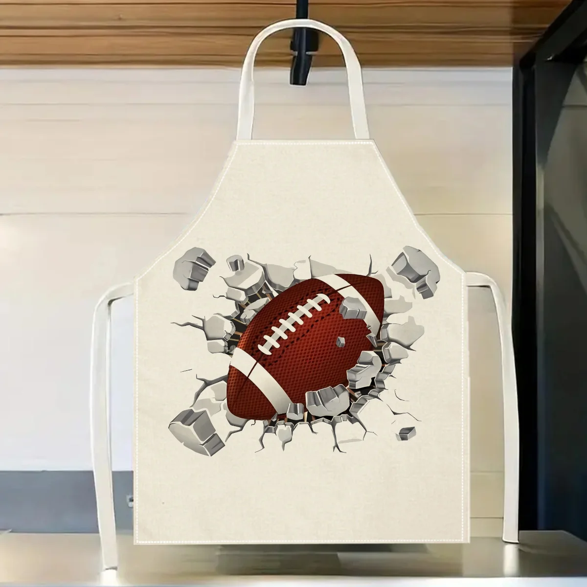 1pc American Football Apron Sports Print Linen Kitchen Apron with 3D Breakthrough Design Brown Football and Cracked Wall
