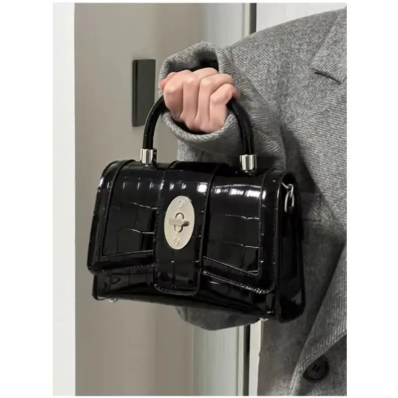 High-grade texture foreign chain patent leather motorcycle bag bag women\'s 2024 new niche hand-held shoulder crossbody  bag