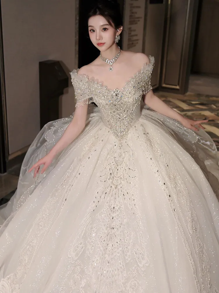 Robes de mariée à paillettes robe de soirée de mariage haut de gamme avec traîne brosse robe de mariée de luxe personnalisée 2026 robes de mariée brillantes