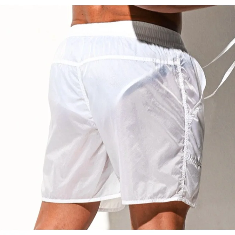 Cross-border wholesale supply Men's loose beach pants vacation travel translucent shorts B4123
