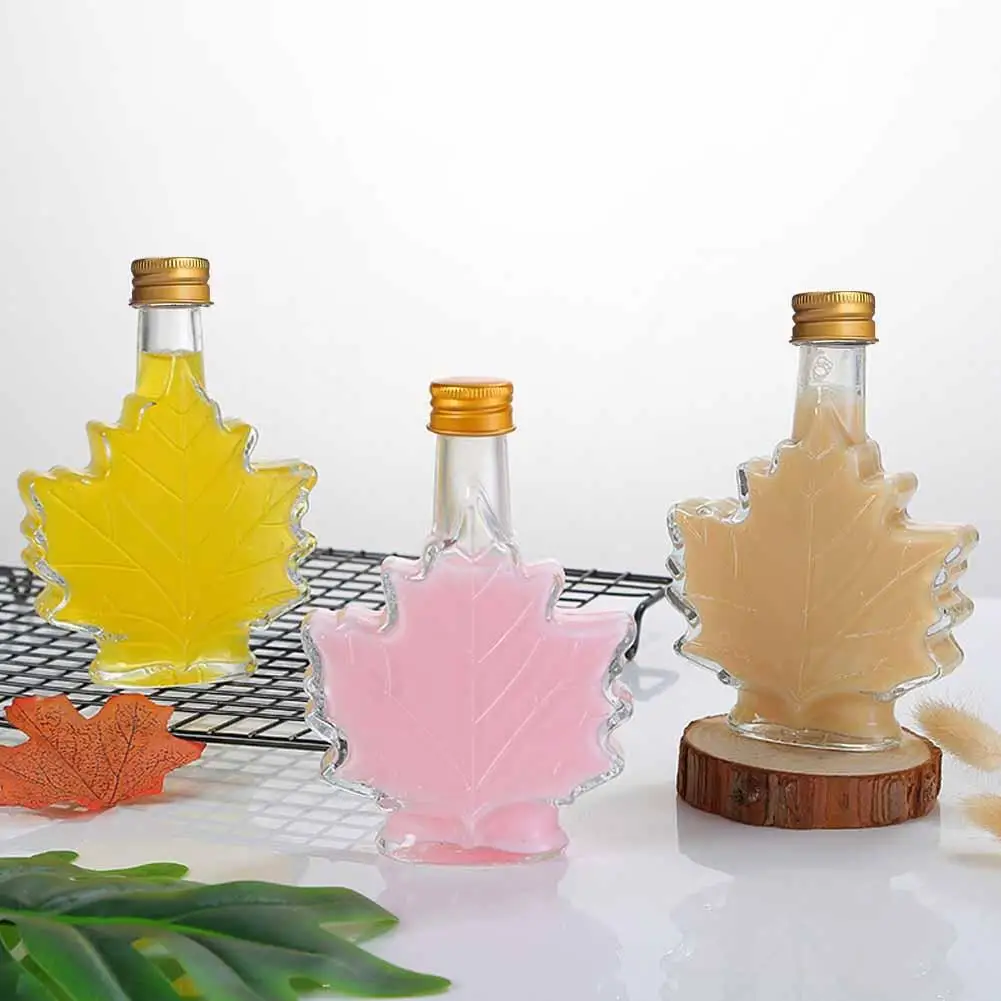 50ml 100ml 250ml Mini Maple Leaf Shape Whisky Alcohol Canning Small Wine Syrup Glass Bottles With Cover For Liquor Scotch