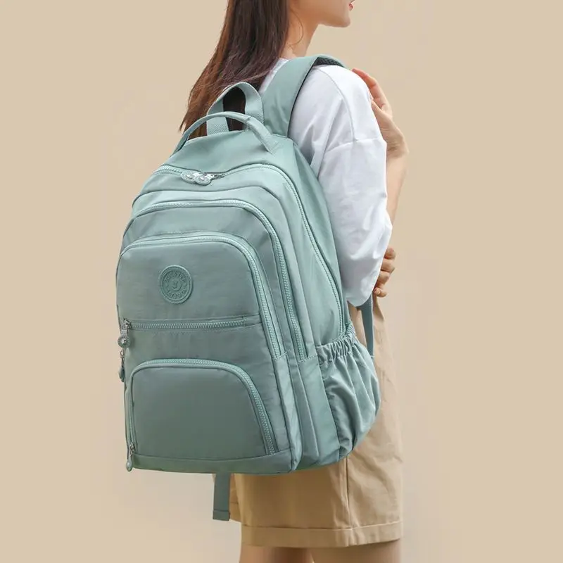 

2023 New Backpack Large Capacity Versatile Waterproof Student Backpack Oxford Cloth Stylish and Lightweight Travel Bag