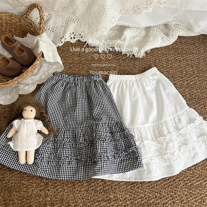

2025 Autumn New Children's Fungus Edge Skirt Girl Baby Korean Version Cotton Black and White Plaid Skirt Fashion