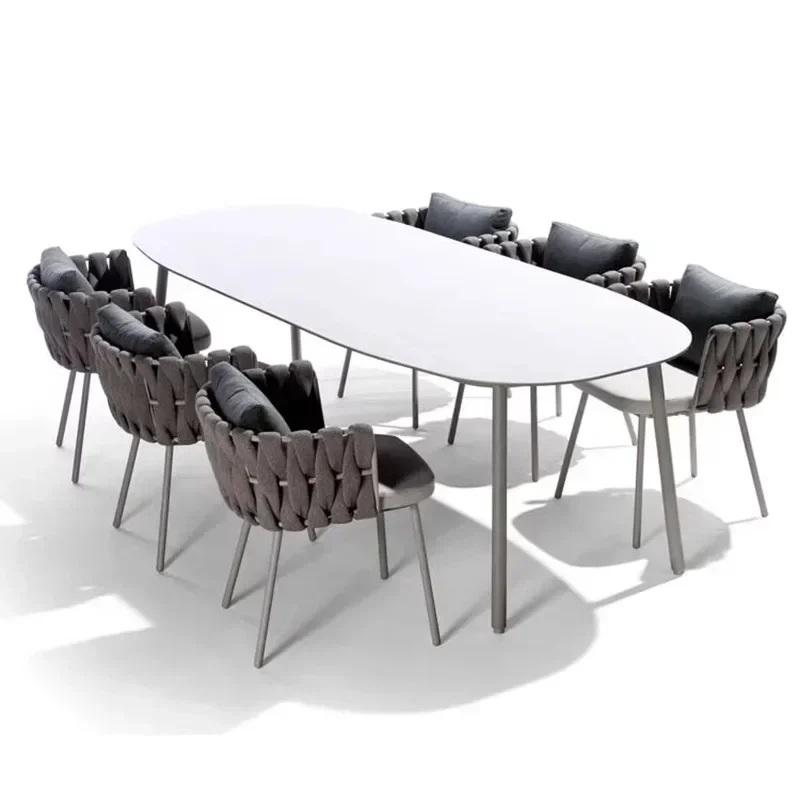 

Outdoor simple tables and chairs, rattan, high-end rock slab dining table, sun room, Nordic, white, oval long table