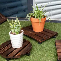 Plant Stands Indoor Move Your Potted Plants with Ease Thanks To This Pot Tray with Carbonized Wood Base and Heavy-Duty Wheels