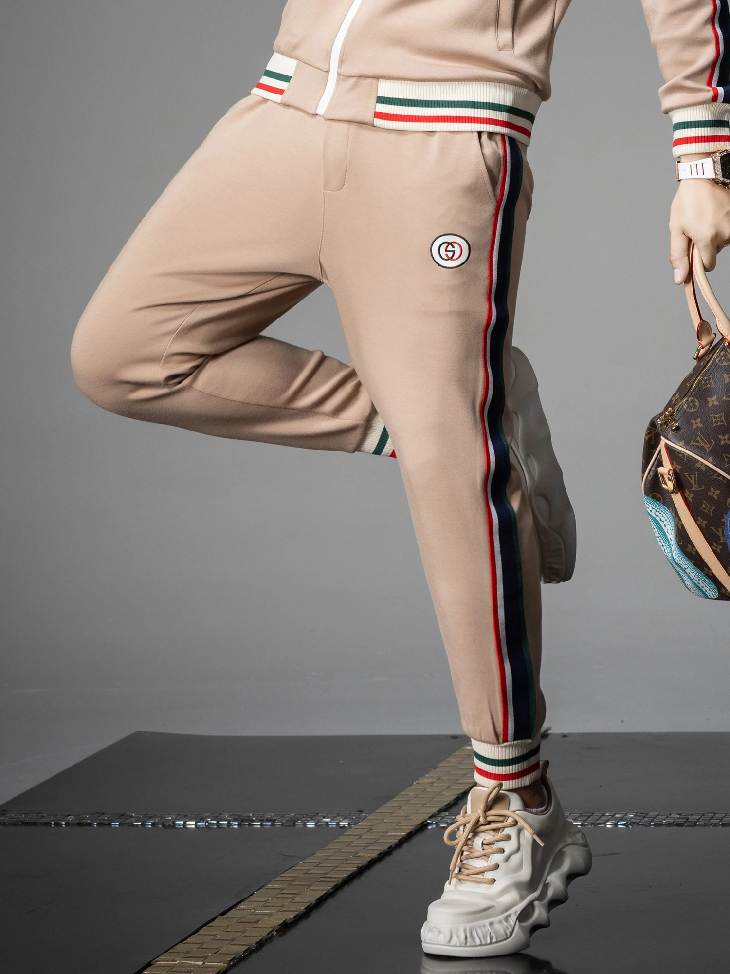 

Модные городские мужские повседневные брюки на осень-зиму, зауженные, с эластичным поясом и манжетами на штанинах, из полиэстера и вискозы