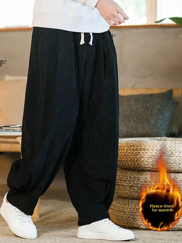 بنطلون شتوي رجالي من القطيفة السميكة مبطن بالفرو فضفاض وواسع الساق بتصميم عتيق يعكس الحيوية الشبابية