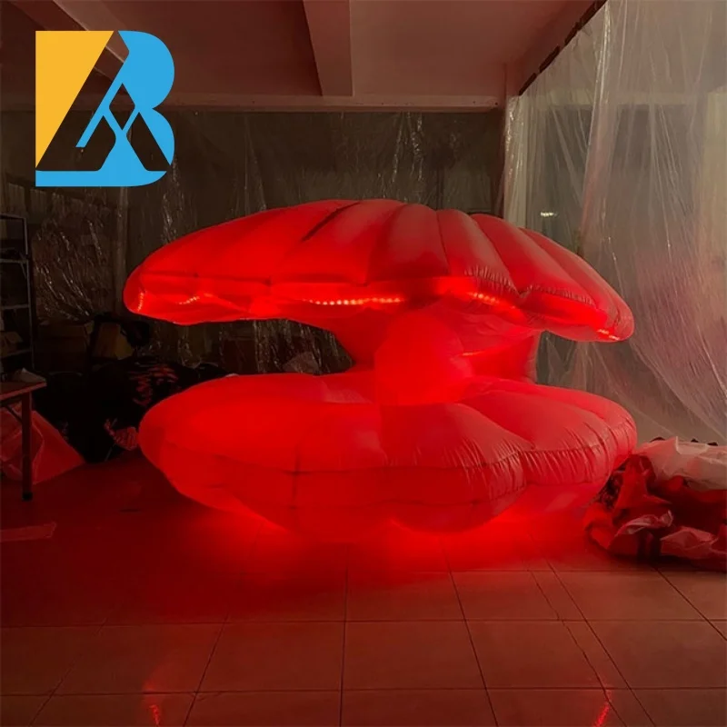 La grande festa a tema Royal Ball personalizzata illumina il guscio gonfiabile del mare per i giocattoli decorativi dell'ingresso sul palco