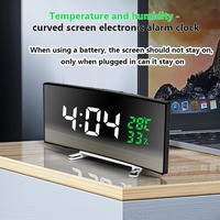 1PC curved screen LED temperature and humidity electronic clock; Multi functional timed alarm clock; Room/Home Decoration