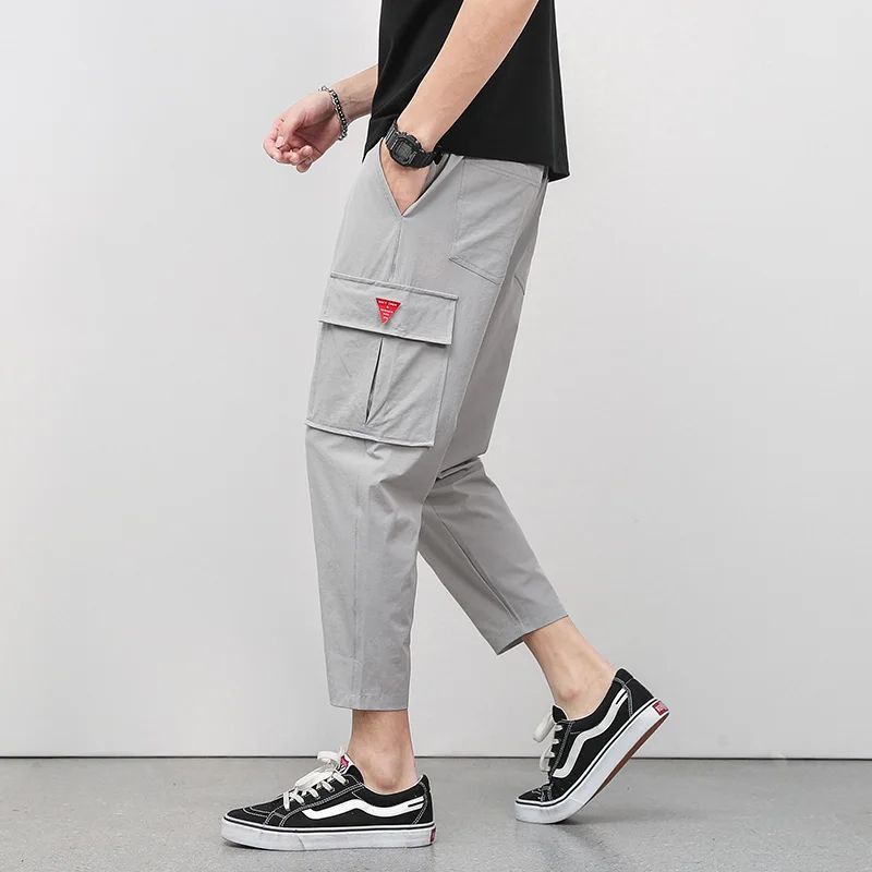 Fashion Elastic Solid Color Pockets Cargo Casual Pants Men's Clothing 2024 Summer New Loose High Waist Korean Cropped Pants