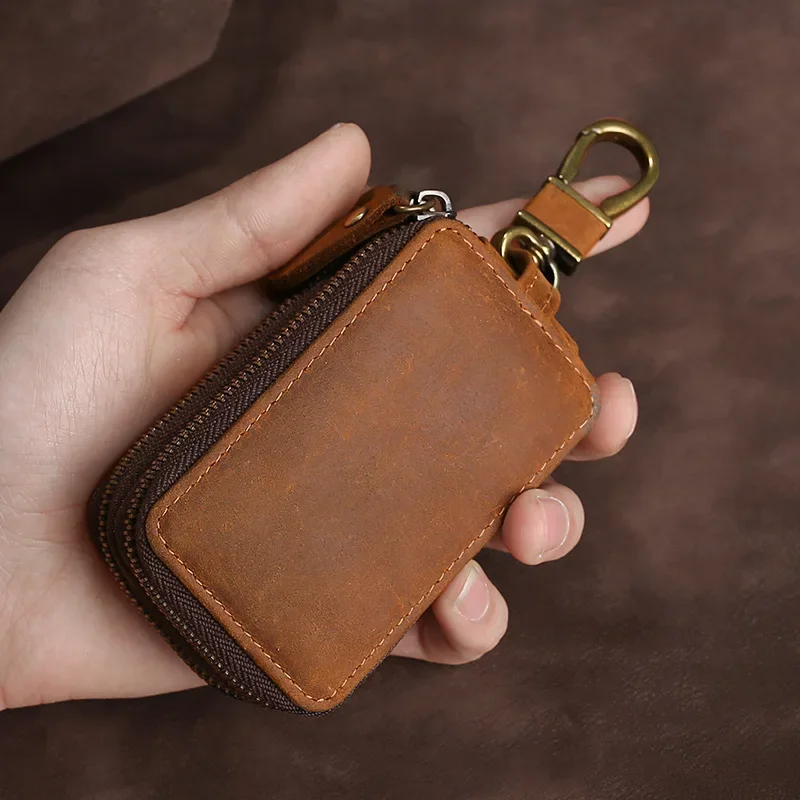 Portfel z prawdziwej skóry na klucze, brelok na zamek błyskawiczny, męski uchwyt na kluczyk samochodowy, torba typu worek wysokiej jakości, designerskie etui na klucze dla kobiet