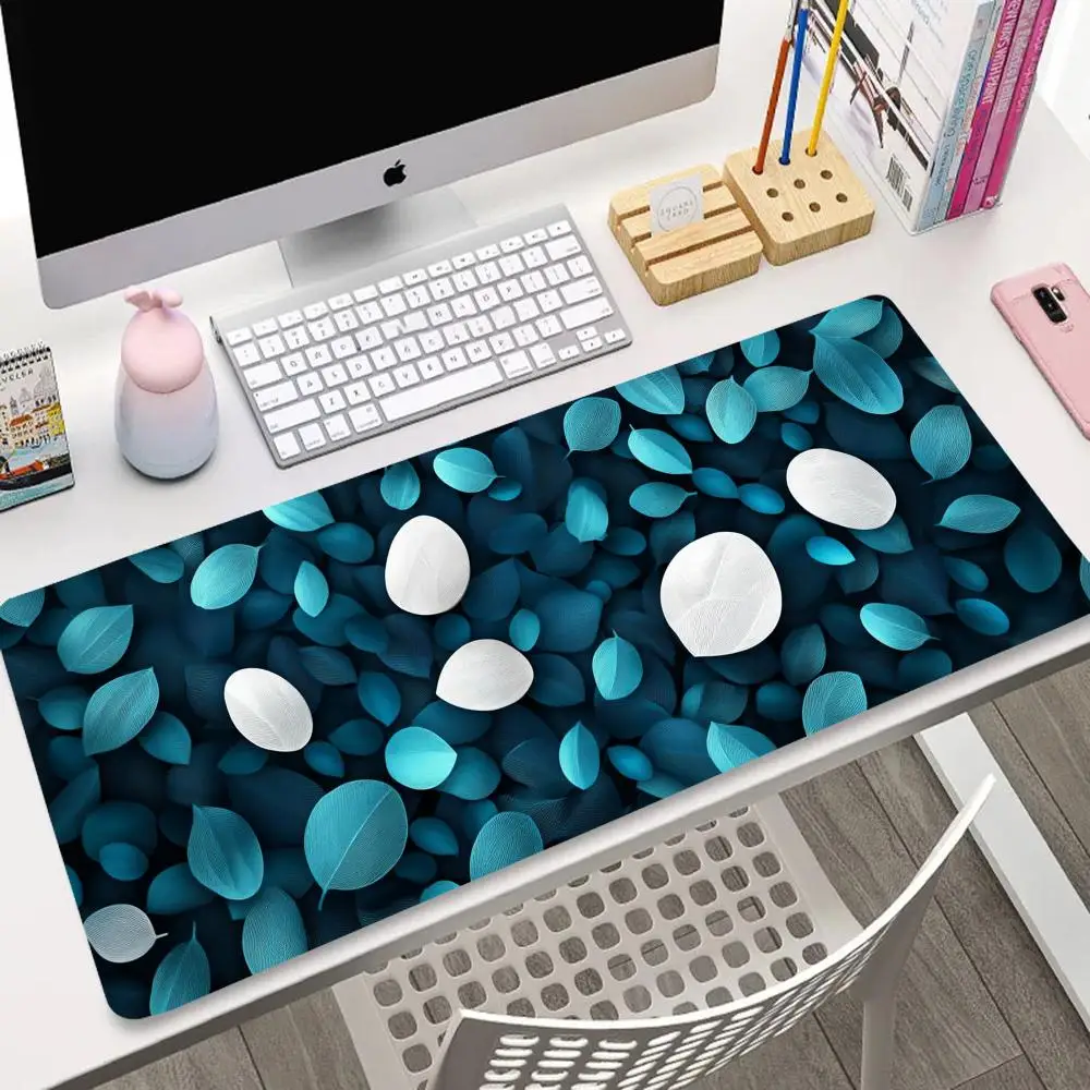 

A mouse pad with green leaf and white pebble patterns Gaming PC Keyboard Desktop accessories Endless gaming rubber non-slip