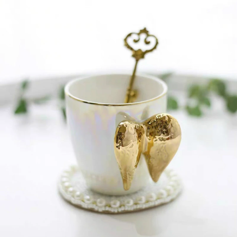 

Mugs Coffee Cup with Golden Angel wings Home drinkware Decoration Beautiful and Novelty Ceramic Milk Coffee Breakfast Cup Gift