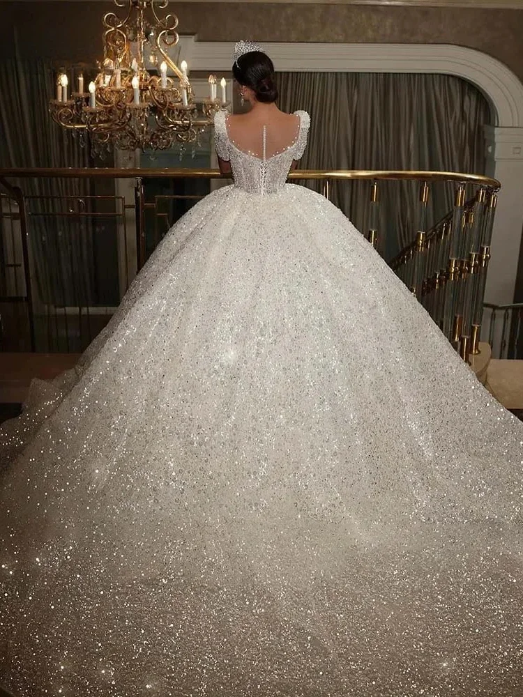 Luxo sheer o-pescoço vestido de casamento brilhante mangas curtas espartilho a linha princesa vestido de noiva novia