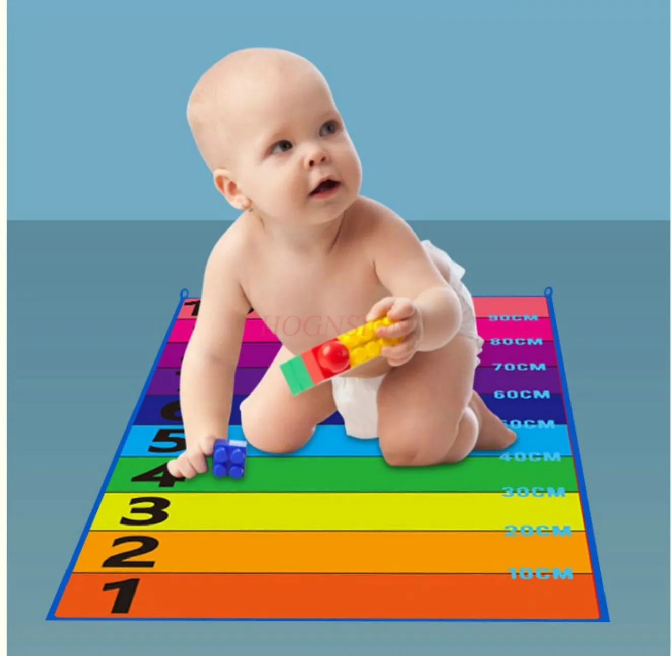 Kinderen raken hoogte om goddelijke hulpmiddelen te bevorderen, tieners springen training, speelgoed plakken, huishoudelijke dekenpads op lange hoogte