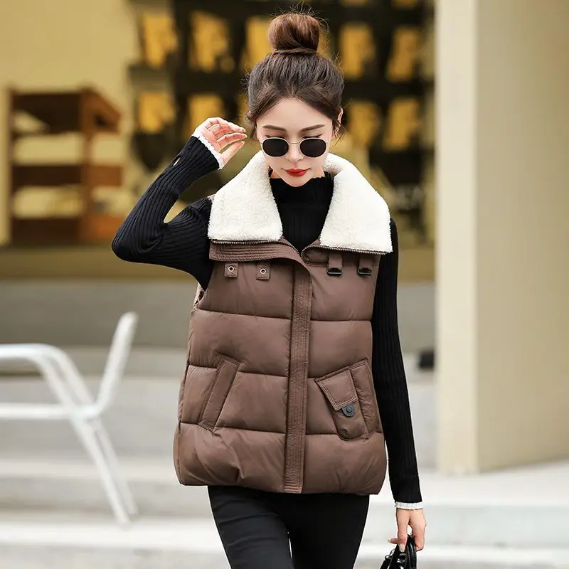 سترة شتوية دافئة جديدة لعام 2026 سترات للنساء موضة بدون أكمام مع سحاب منتفخ صدرية على طراز الشارع ملابس خارجية للسيدات #1