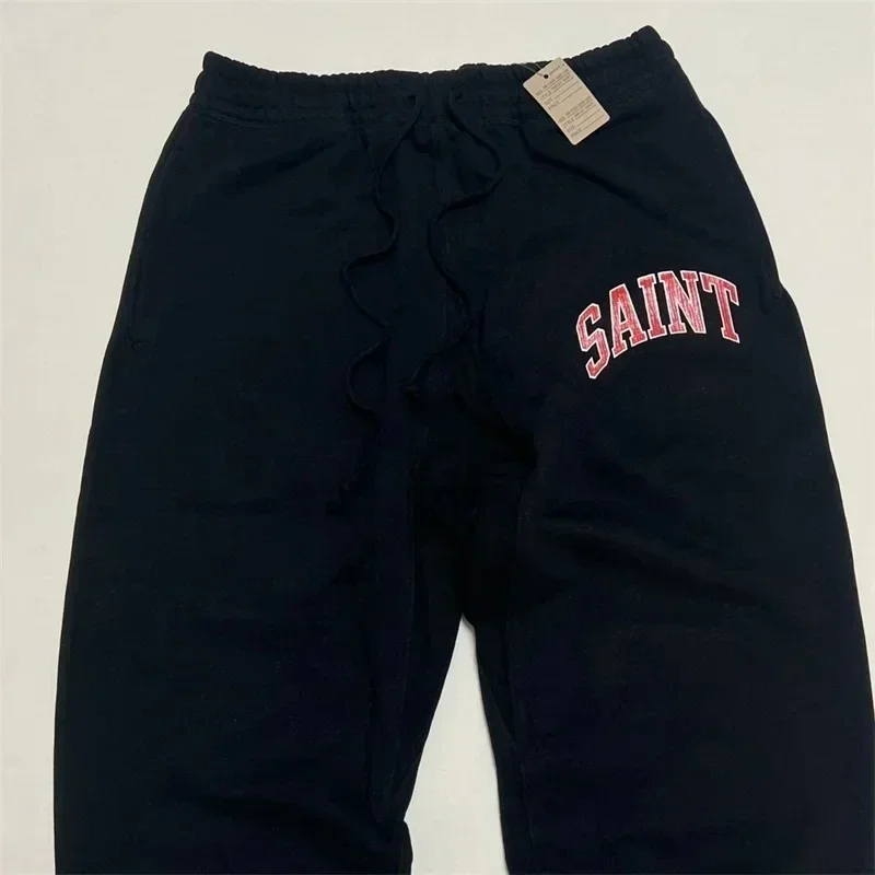 

24ss Black SAINT MICHAEL Pants Men Women 1:1 Top Quality Cracked Retro Print SAINT LOGO Oversized Sweatpants