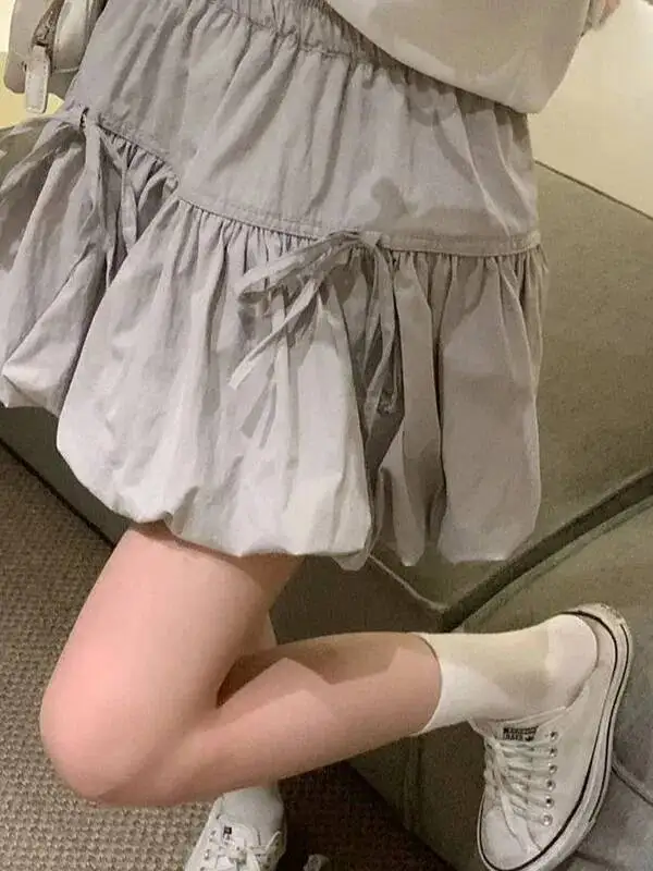 Coréen nœud papillon une ligne jupes femmes été taille haute lanterne Mini jupes femme couleur unie Style doux jupe filles LYS9