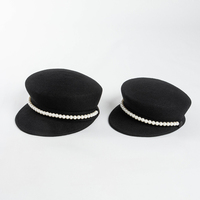 Autumn and winter new fashion casual pearl chain wool cap ladies warm newspaper boy hat fashion hat tide