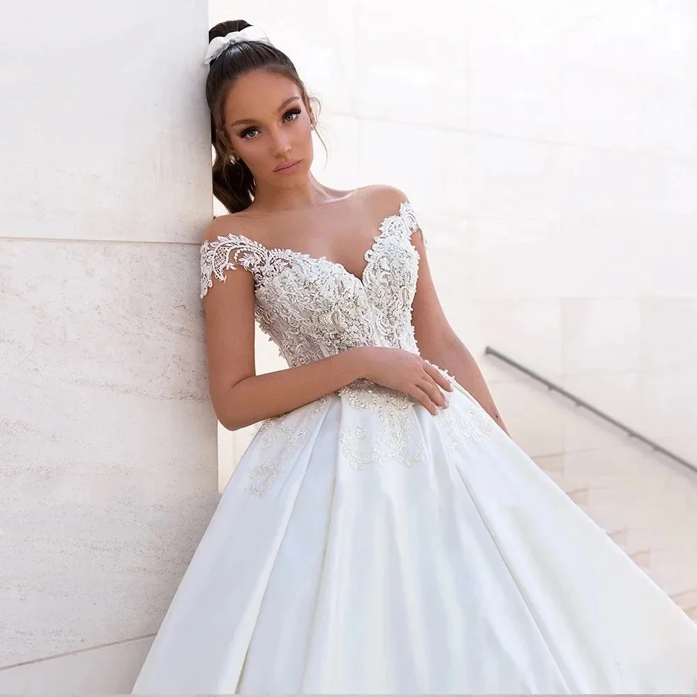 Sexy sem costas uma linha vestidos de casamento de cetim luxo applique sem mangas vestido de noiva trem catedral vestido de noiva personalizado 2025