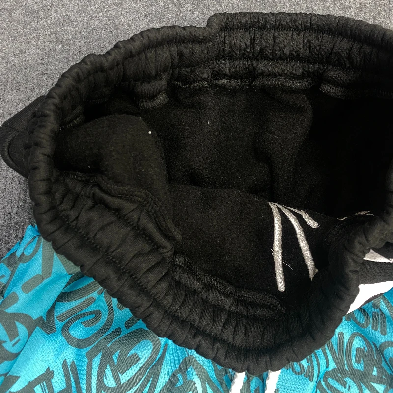 Los Pantalones anchos de doble cintura están de moda, vanguardistas, superpersonalizados y falsos de dos piezas con patrón fluorescente