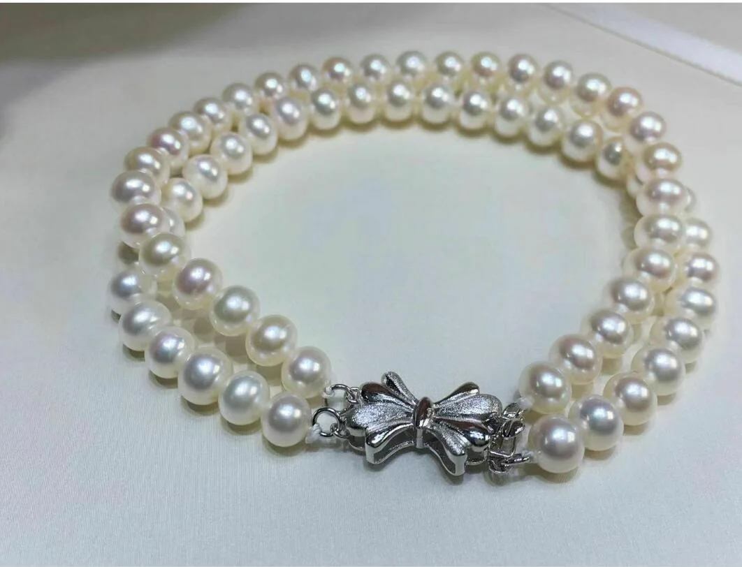 

Double Strand Nanhai AAA 7-8mm White Pearl Bracelet 7.5-8 inches 925S