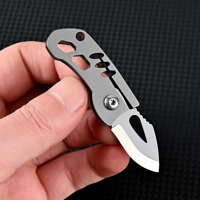 

Portable Sharp Titanium Alloy Mini Folding Knife High Hardness Steel Portable Keychain Pendant Unboxing Express Delivery Knife