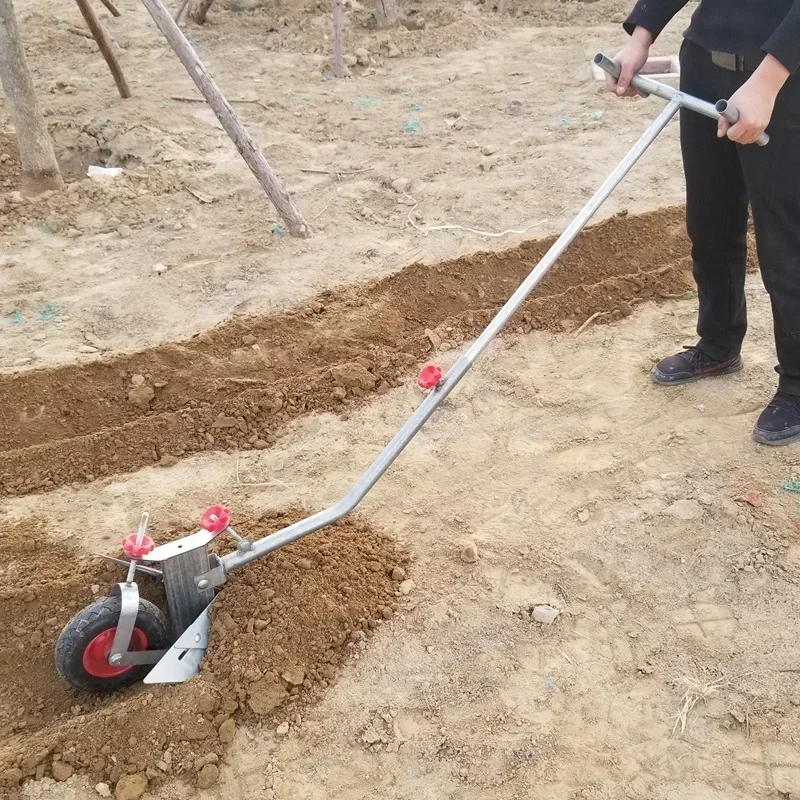 Small agricultural trenching machine, plowing machine, manual household mountain hand pulled single person plowing and soil plow