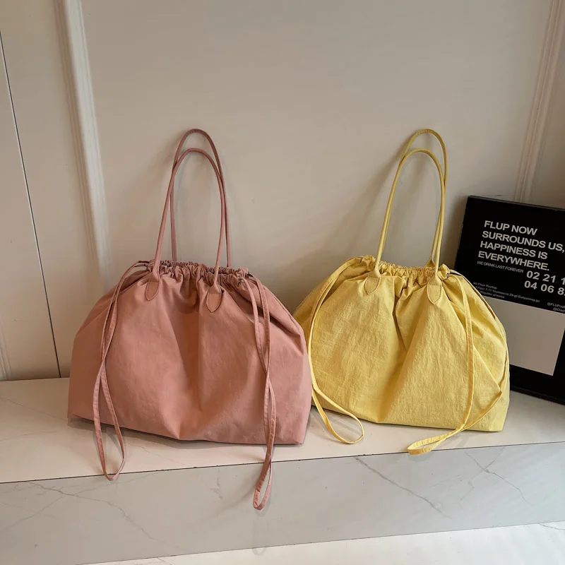 

2026 Summer New Drawstring Shoulder Bags for Women Fashionable Large Capacity Solid Color Pleated Fabric Lightweight Handbag