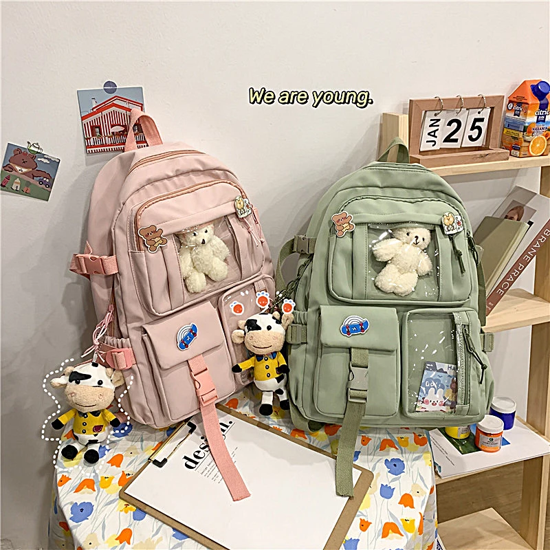 Elementary and middle school students multi pocket solid color large capacity multi functional backpack travel bag for girls