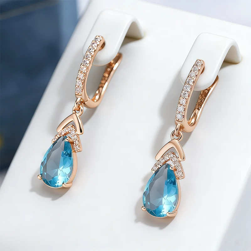 Wbmqda Lange baumelnde Ohrringe mit blauem Stein für Damen, 585er Roségold, einzigartiges Zirkon-Schmuckzubehör