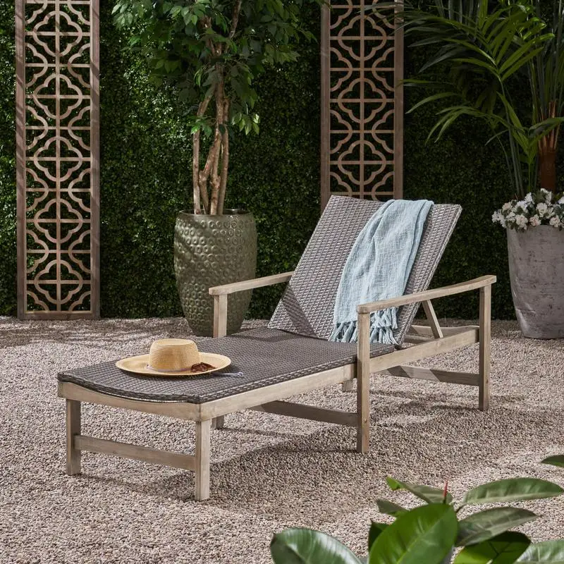 

Wood and Wicker Chaise Lounge Chair