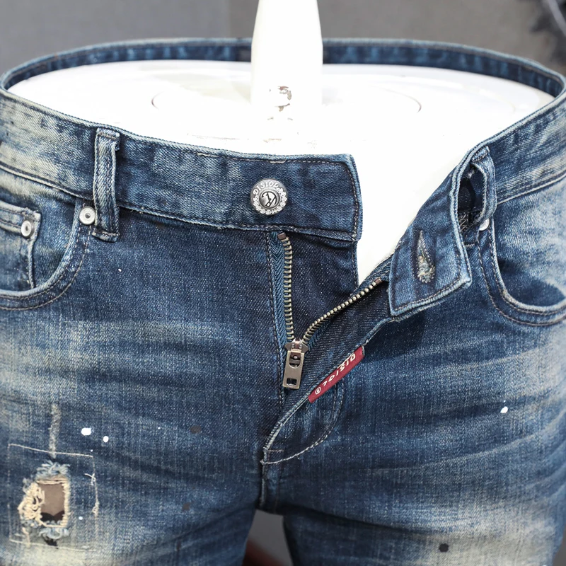 Newly Designer Fashion Men Jeans Retro Black Blue Elastic Slim Fit Painted Ripped Jeans Men Patched Vintage Denim Pants Hombre