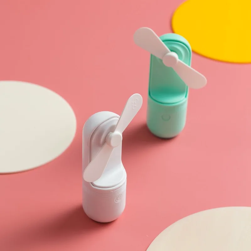 Capsule Mini Fan Ultra-Compact Design Foldable Blades Two Speed Settings Smart One-Touch Stop Large Battery Capacity