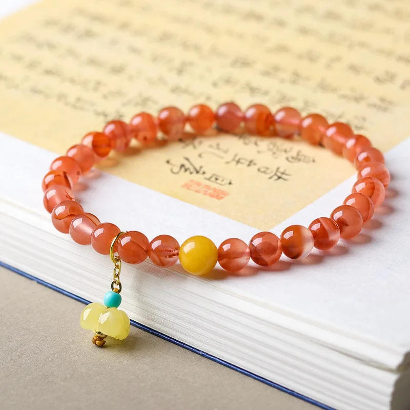 Original natural South Red Agate bracelet with floating floral patterns featuring honey-colored amber and osmanthus a new C