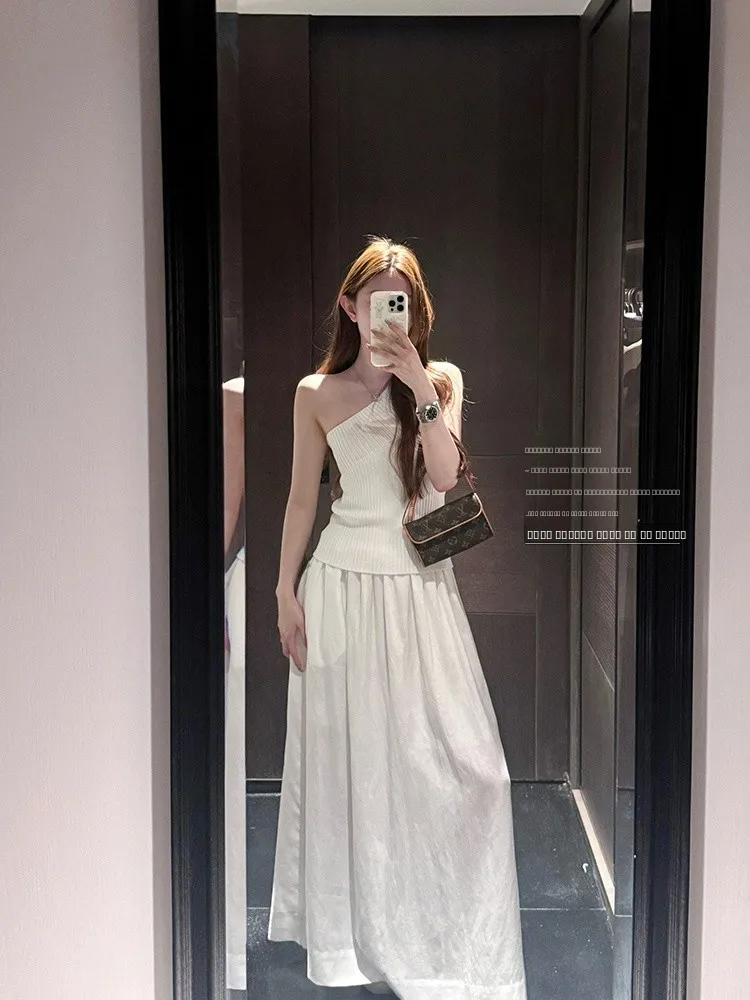 

Вязаный комплект из жилета и длинной юбки с диагональным узором на плечах, летний модный женский костюм-двойка, простой и элегантный