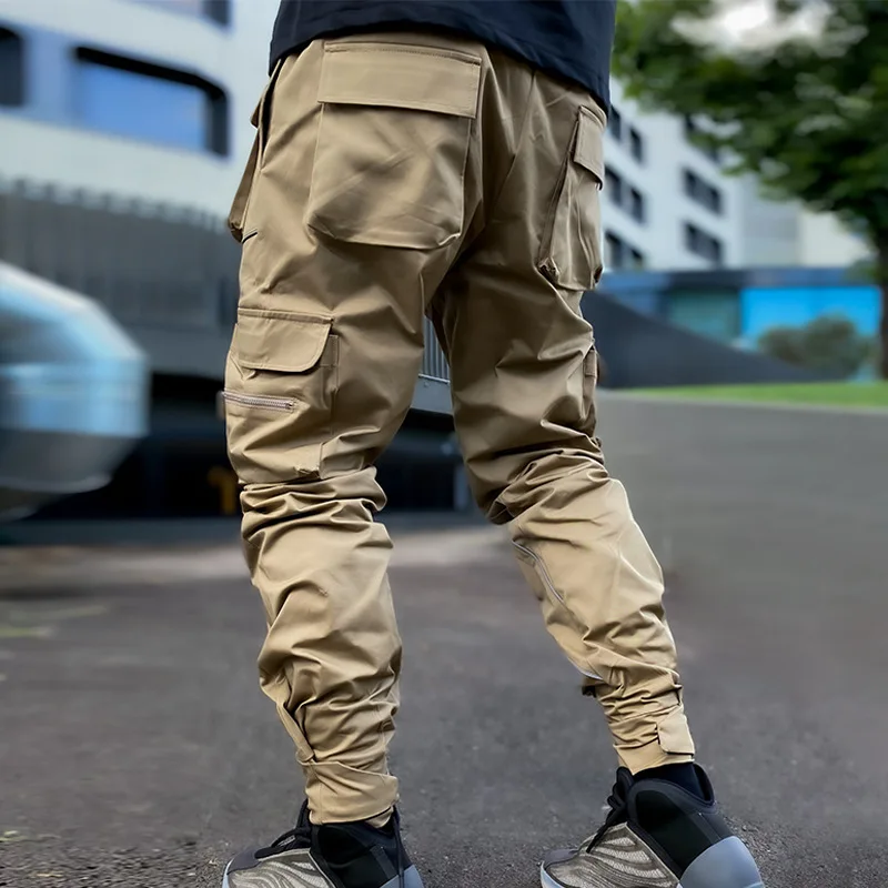 الرجال السراويل البضائع العاكسة 2025 جديد الهيب هوب ركض غير رسمية بنطلون متعدد جيب الرجال Sweatpants الشارع الشهير الرياضة بانت M-3XL
