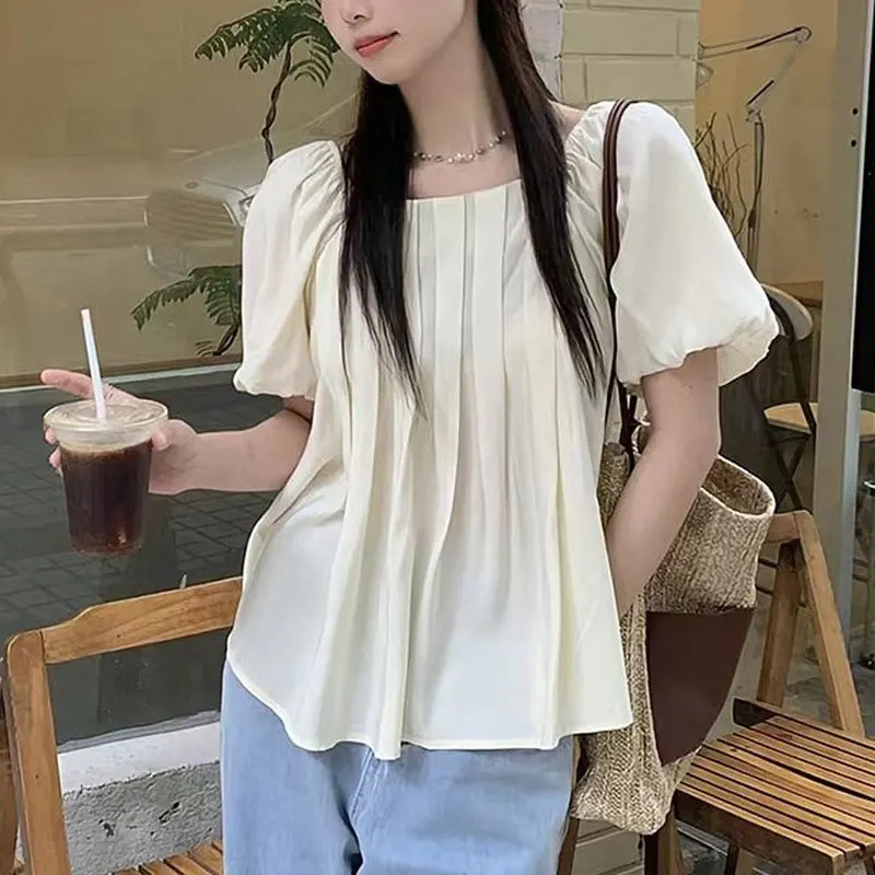 Chemisier à col carré pour femmes, vêtements de Style français, manches bouffantes, nouvelle couleur unie, chemises amples à la mode, pliables, été