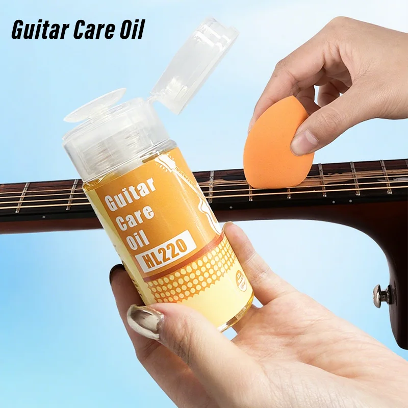 

100ML Guitar Care Oil Fretboard Care Clean Polish Oil Strings Cleaner Remove Dirt Press-Type Bottle with Sponge Applicator