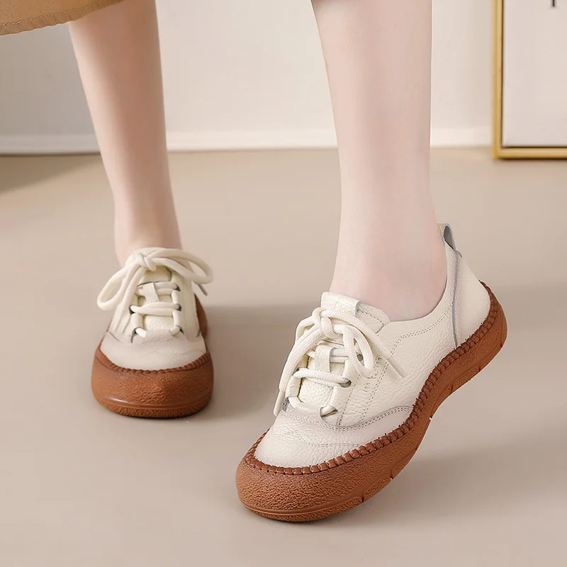 Woman Laced Up Mocc…