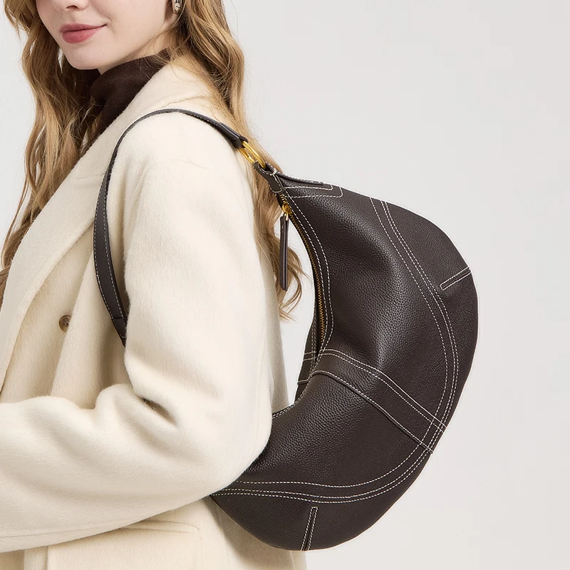 

Женская кожаная сумка из воловьей кожи с верхним слоем, женская сумка в форме полумесяца, легкая роскошная женская сумка на одно плечо под подмышками, новинка 2025 г.